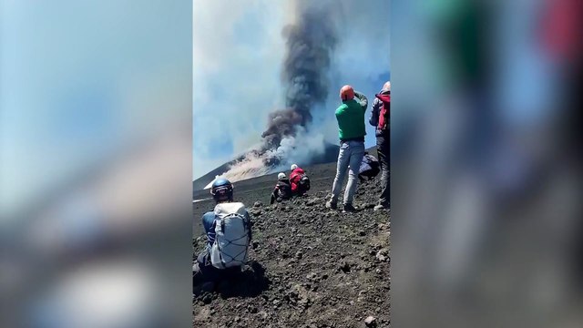 This is the moment a Derbyshire tourist had to abandon his position and run, as Mount Etna began to erupt.