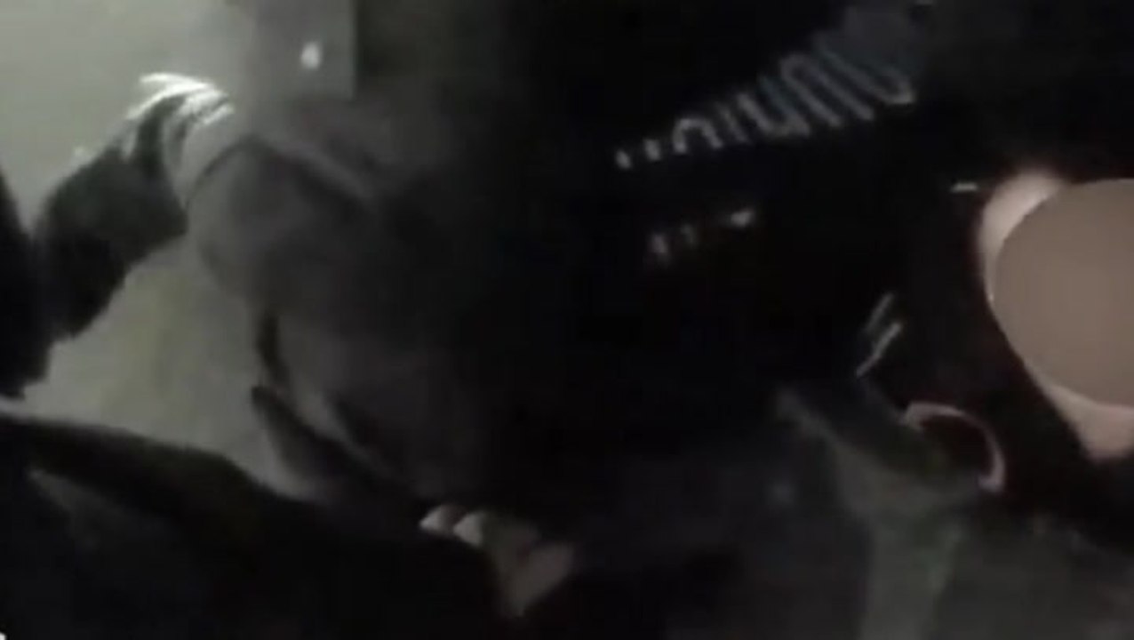 Police officer pins boy to floor and screams in his face in shocking body worn camera footage