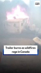 Trailer burns as wildfires rage in Canada
