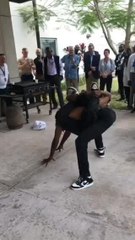 Contortionist Bends And Twists Around Man