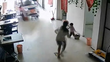 Moment girl, 11, narrowly saves baby sister from runaway vehicle in last-second rescue