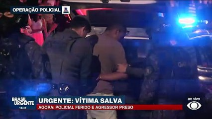 Veja o momento em que homem que fez mulher refém é colocado na viatura