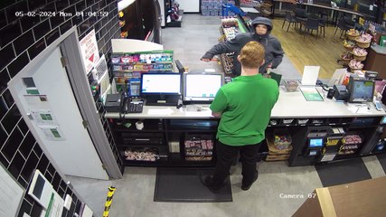 CCTV shows Redan service station worker threatened with hammer