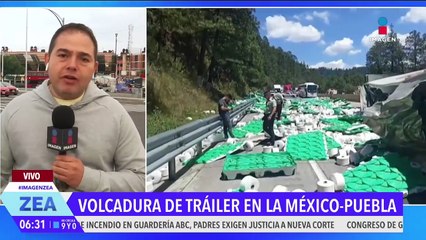 Vuelca tráiler cargado con hilos industriales en la México-Puebla