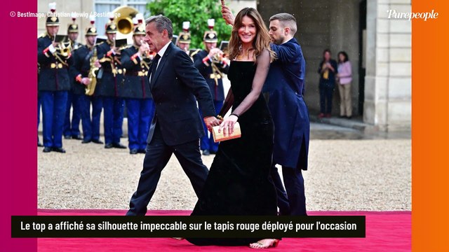 Carla Bruni, rayon de soleil malgré la pluie : elle affiche sa silhouette impeccable pour son retour à l'Elysée, lors d'un dîner prestigieux