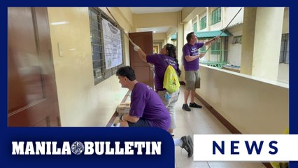 TELUS executives join volunteers to help improve classrooms at Timoteo Paez Elementary School