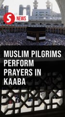 Muslim pilgrims circle Kaaba, perform stoning ritual on hajj morning
