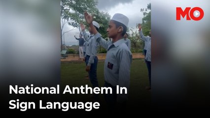 Madrasa students sign the National Anthem