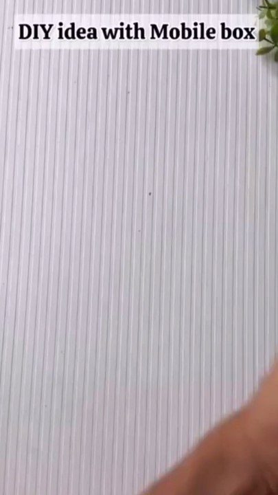 Turn the Old Mobile Phone Box into a Beautiful Wall DecorGive your old mobile phone box a new life by transforming it into a beautiful piece of wall decor!