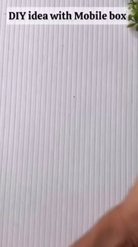 Turn the Old Mobile Phone Box into a Beautiful Wall DecorGive your old mobile phone box a new life by transforming it into a beautiful piece of wall decor!