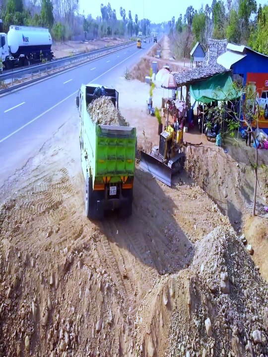 Fantastic Work! Small Bulldozer Turns Water Into Land for New Building
