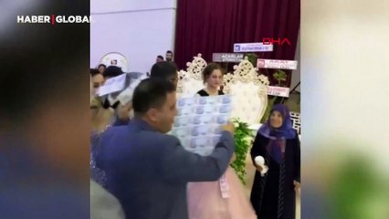 Takı merasiminde dikkat çeken damat yeleği