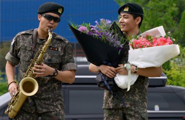 BTS' RM and V have been discharged from the South Korean military and teased the K-pop group's return