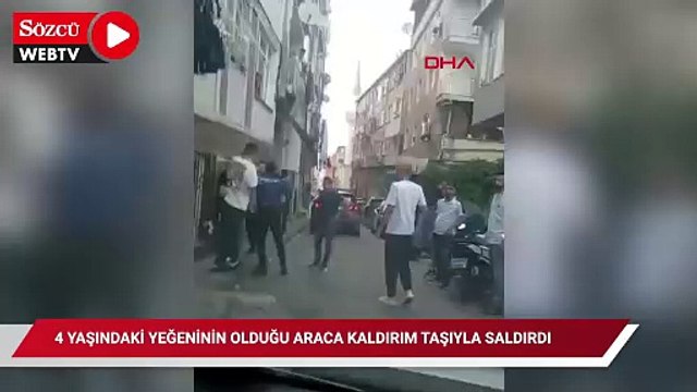 Fatih'te 4 yaşındaki yeğeninin olduğu araca kaldırım taşıyla saldırdı