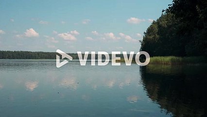 Water ripples on tranquil lake in peaceful natural