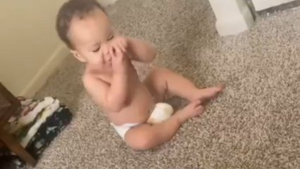 8-month-old baby meets puppy for the first time and gets confused