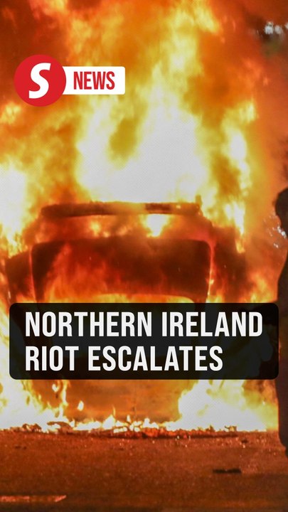 Northern Irish rioters attack police, torch houses for second night