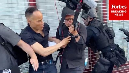 LAPD Officers Rush Into CNN Crew During Anti-ICE Demonstrations In Los Angeles, CA