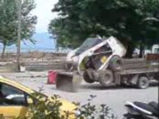 comment faire rentrer une pelleteuse dans un camion ?