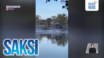 Helicopter, bumagsak sa lawa matapos subukang mag-igib ng tubig para tumulong sa pag-apula ng sunog | Saksi