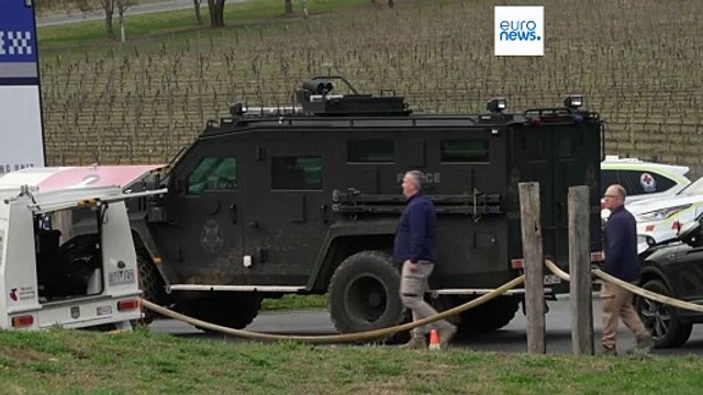 Manhunt for gunman in fatal shooting of two Australian police officers continues