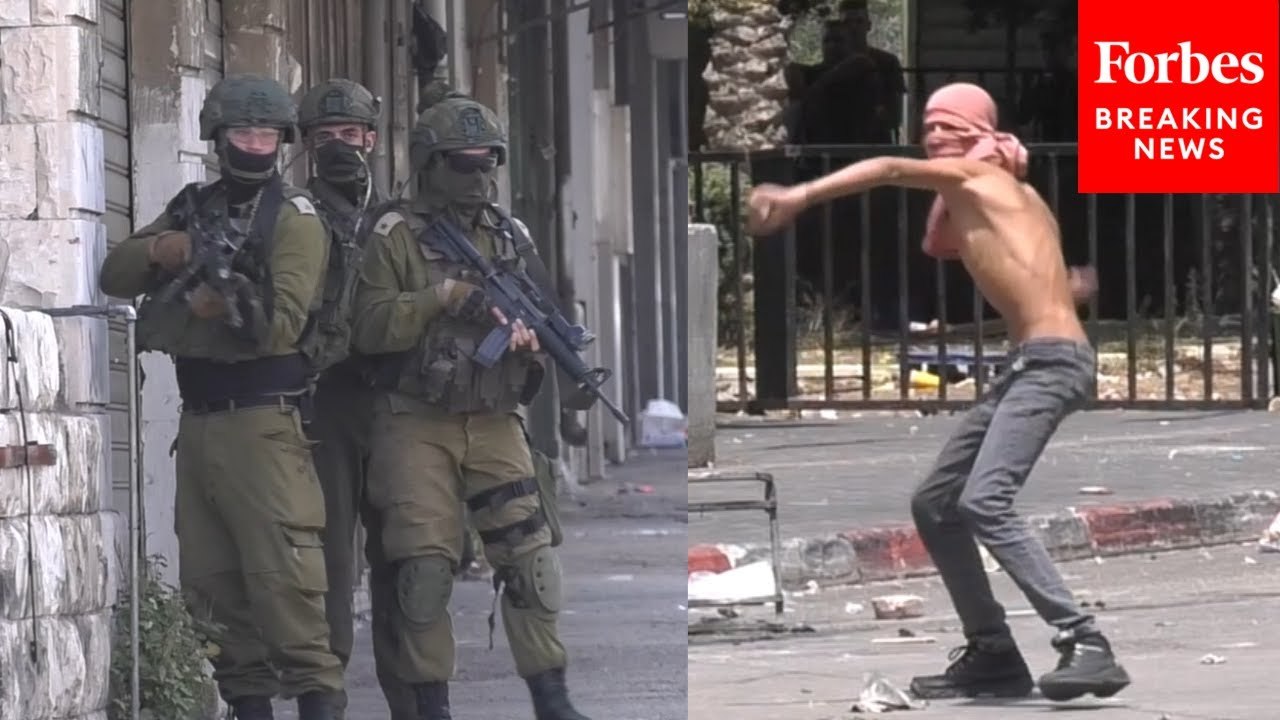 Palestinians Clash With Israeli Forces During Raid In Nablus In The Occupied West Bank