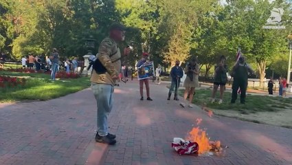 Military veteran detained after burning American flag in protest at Trump’s executive order
