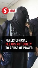 Govt department director claims trial to power abuse charge