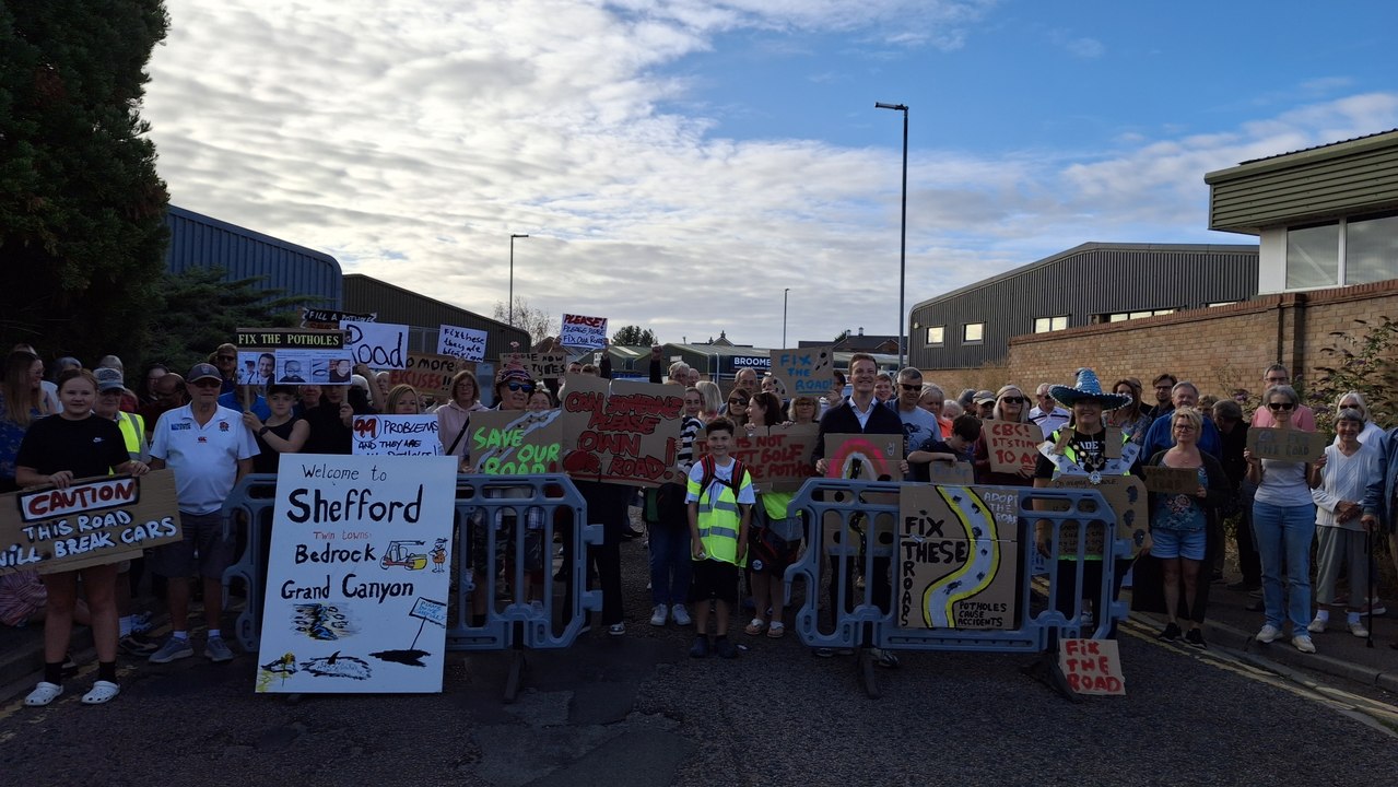 MP joins protest over state of 'unadopted' road