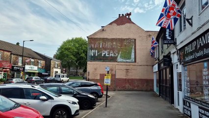 1950s style wall advert revealed in Sheffield, and may be kept permanently