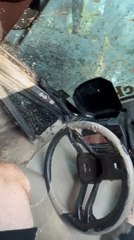 Person Gets Stuck in Vehicle Partially Submerged in Muddy Floodwater