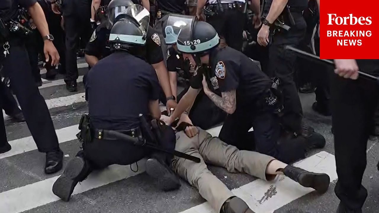 NYPD Officers Make Arrests During Anti-ICE Protests Outside Federal Building In NYC