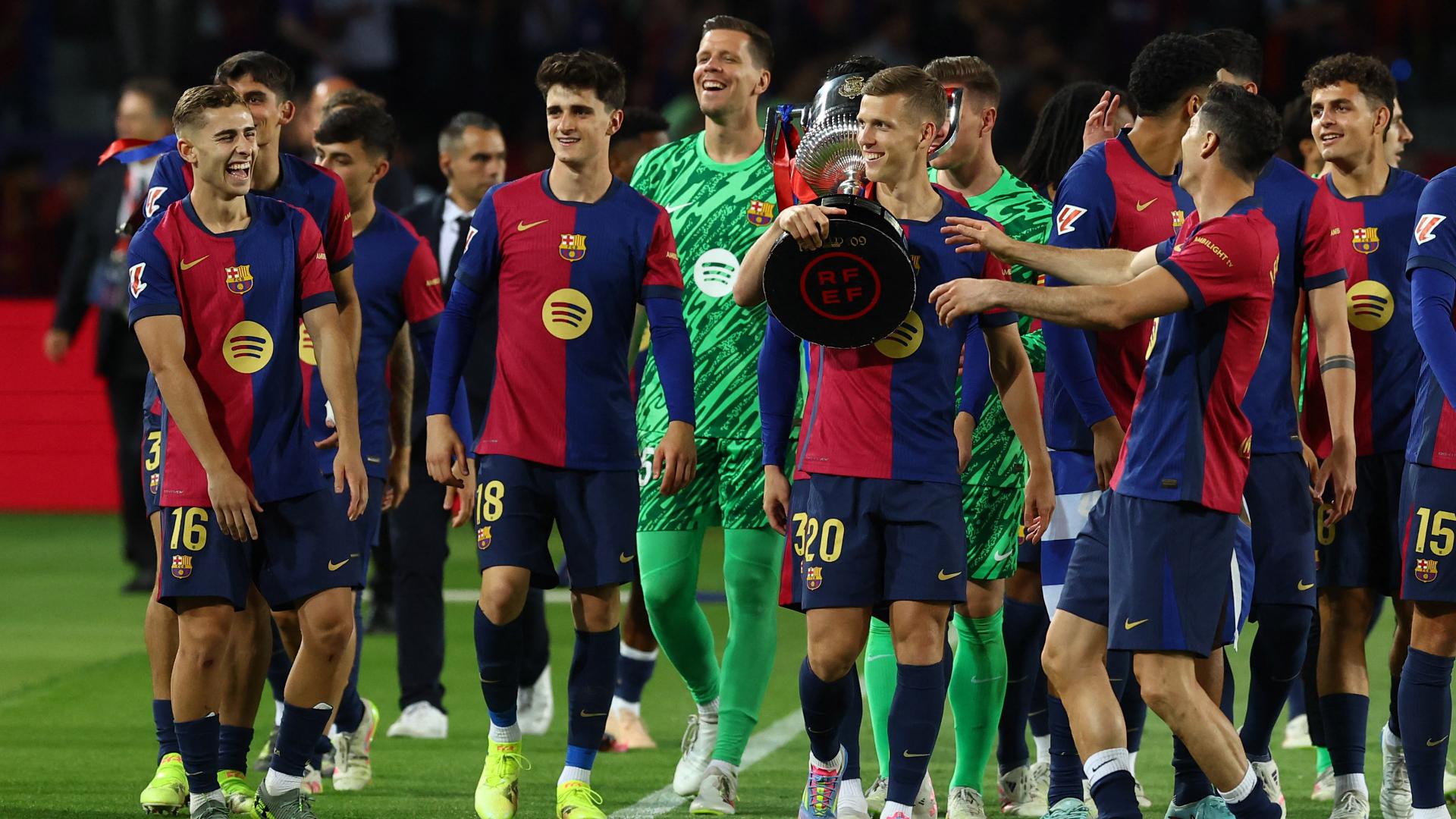 Hansi Flick reflects on the positive environment at FC Barcelona, praising the unity and spirit within the squad