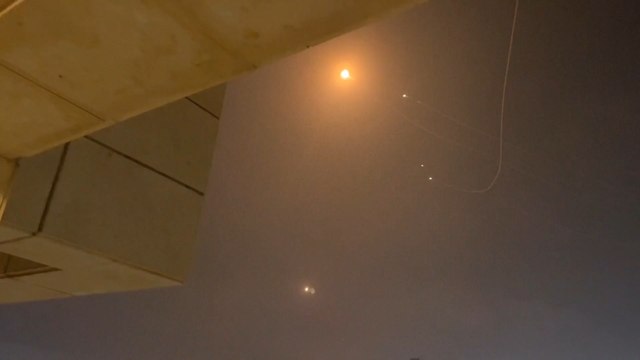 WATCH: Terrifying moment Iranian missiles rain down on Tel Aviv as Israelis rush for safety