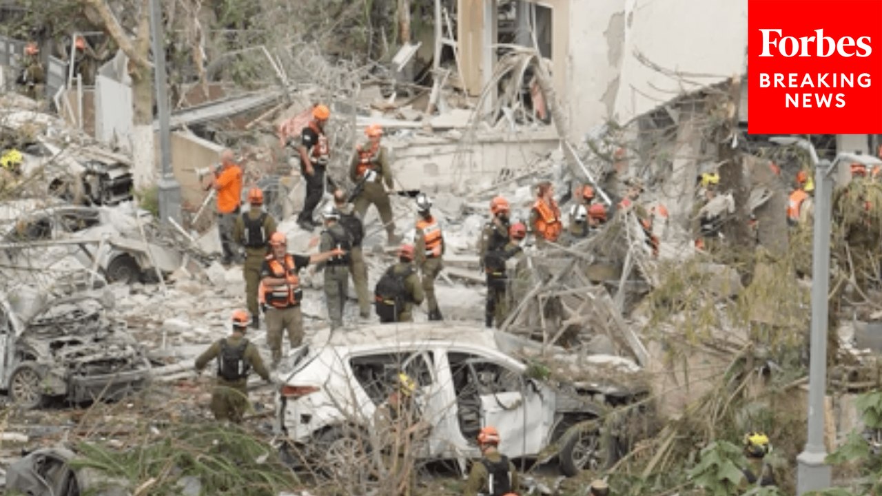 Israeli Emergency Personnel Respond To Destruction Caused By Iranian Airstrikes In Rishon Lezion