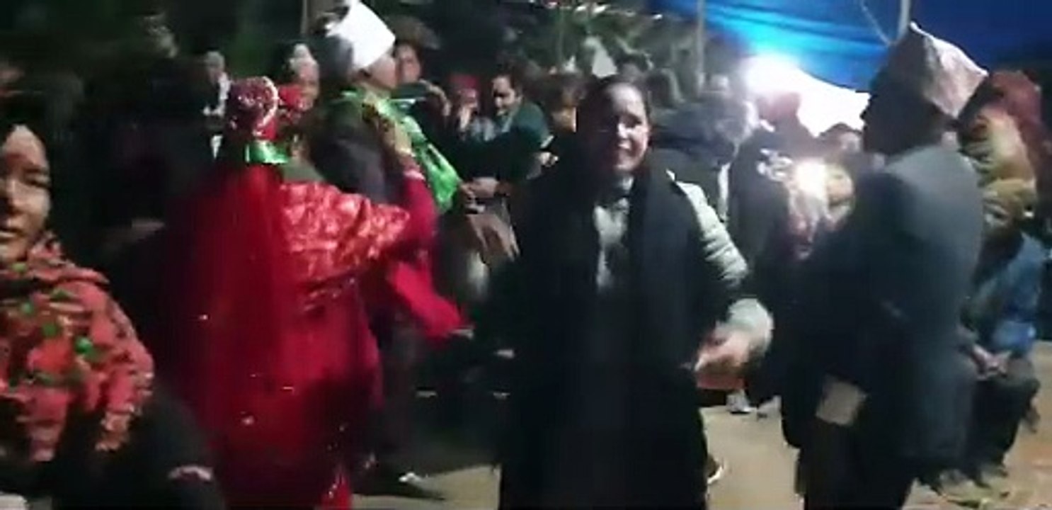 bride and groom dancing with family members | dance in Naumati baja |