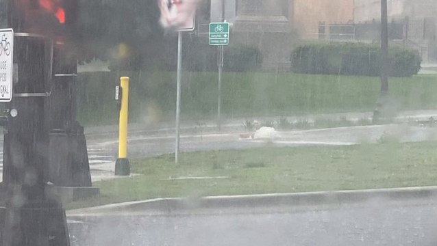Overflowing storm drains due to heavy rain