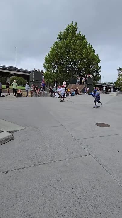 Two Men Collide While Skateboarding and Both Fall Down