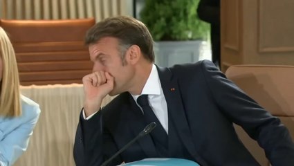 Italian Prime Minister Giorgia Meloni rolls her eyes as President Macron whispers to her at G7 roundtable