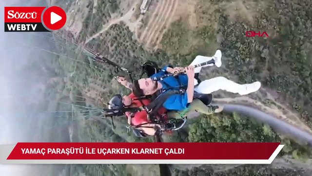 Yamaç paraşütü ile uçarken klarnet çaldı