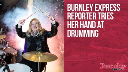 Burnley Express reporter Sue Plunkett gives drumming a bash
