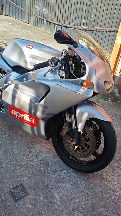 Aprilia rs 125 2t escape doble salida