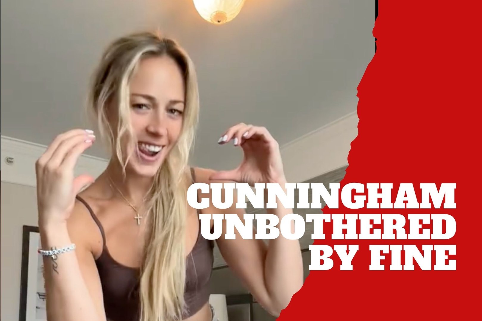 Cunningham dances while appearing unconcerned about the fine imposed by the  WNBA after her fight