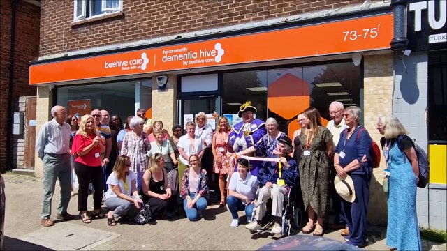 Town crier Bob Smytherman announces the opening of Beehive Care's new community dementia hive in Lancing