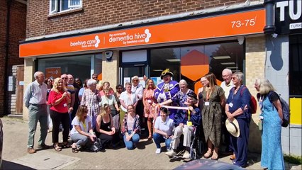 Town crier Bob Smytherman announces the opening of Beehive Care's new community dementia hive in Lancing