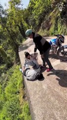 This couple rescues a guy hanging from a cliff!.hd