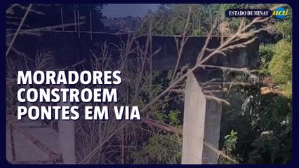 Moradores do Novo Lajedo, na Região Norte de BH, constroem pontes para acessarem casas