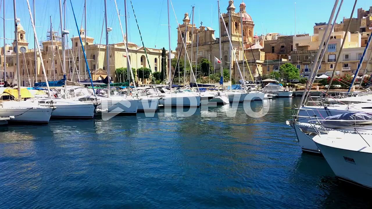 Beautiful marina harbour in Malta filled with boats nice buildings in background