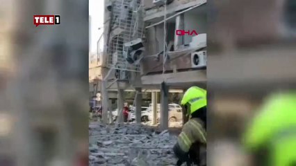 İran'ın saldırısı sonrası İsrail'de bir hastanede ile borsa binasında meydana gelen patlamalar ve yıkım.