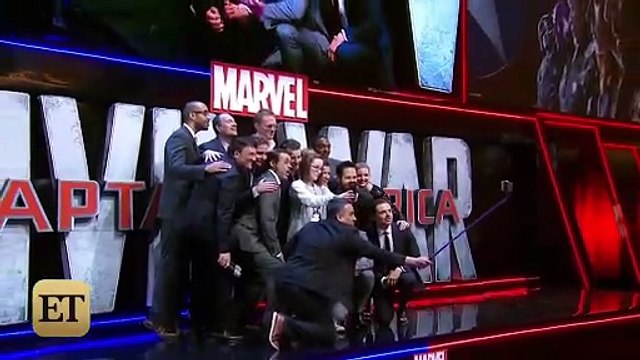 Chris Evans Can't Keep His Eyes Off Elizabeth Olsen's Chest at 'Captain America_ Civil War' Premi…